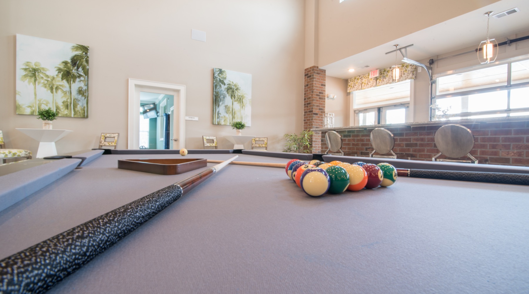 a clubroom with a pool table