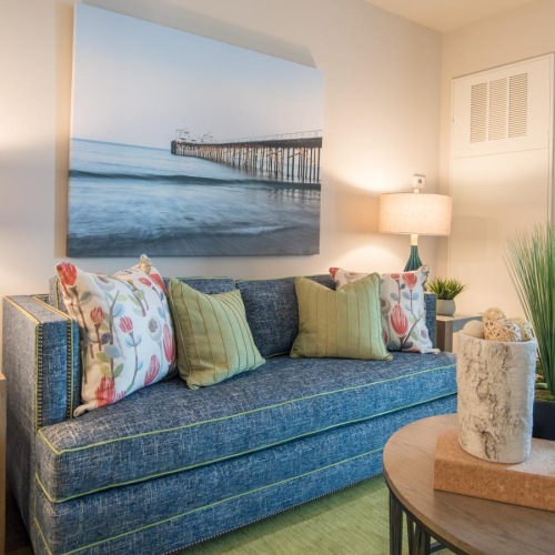 a living room with a couch and a table